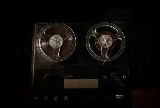 the image of an old reel tape being used as an evp recorder